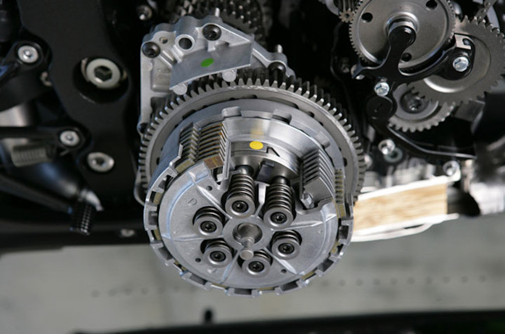 How does a slipper clutch in a motorcycle work?