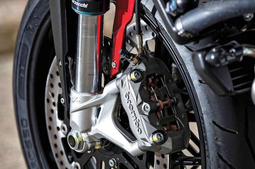 My motorcycle's fork is leaking oil – what should I do?